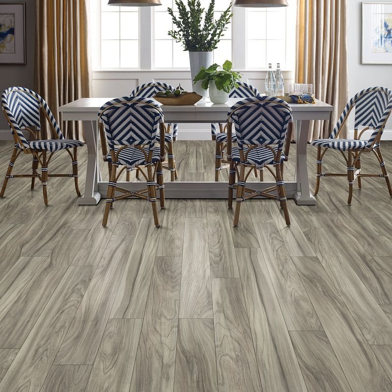 Dining room with Repel Laminate flooring - Wood-look laminate flooring from Carpet Innovations in Denver, CO