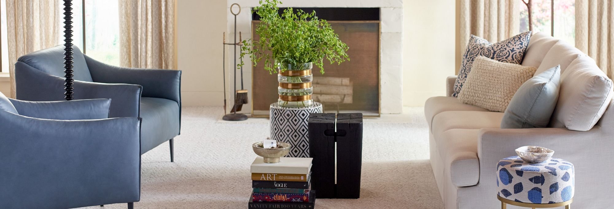 Living room with two couches and a beige textured carpet from Carpet Innovations in Denver, CO