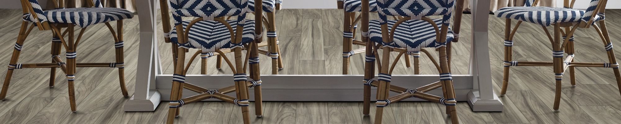 Dining room with Repel Laminate flooring - Wood-look laminate flooring from Carpet Innovations in Denver, CO